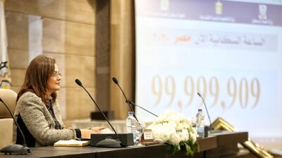Egyptian Minister of Planning Hala Helmy speaks during a press conference next to a screen displaying the live population count at the Egyptian Ministry of Planning, in Cairo, Egypt. EPA