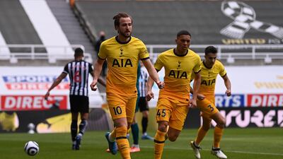 Harry Kane celebrates after scoring Tottenham's first goal against Newcastle. EPA