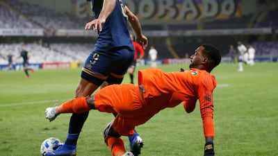 Al Ain goalkeeper Khalid Eisa is caught out by Abderrazak Hamdallah who goes on to score Al Nassr's winner. EPA