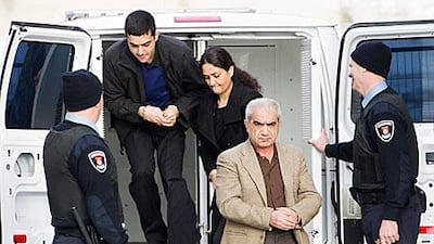 Mohammad Shafia, front, Tooba Yahya, centre, and their son Hamed each face 25 years in jail without parole.