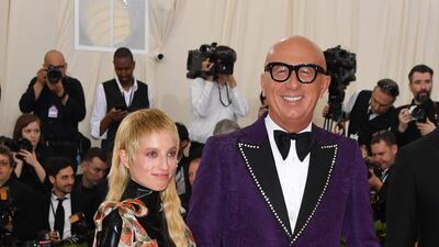 Fittingly for the CEO and President of Gucci, Marco Bizzarri donned a purple suit, picked out with silver beading. Petra Collins meanwhile, wore Gucci SS19. AFP