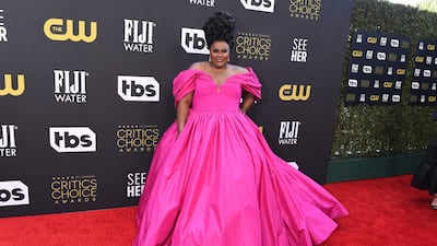US comedian Nicole Byer arrives in a hot pink Alexander McQueen gown. AFP