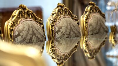 The dining table set cost $165,000.