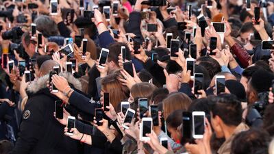 Generation Z use their smartphones for an average of 3 hours a day to consume media. Charles Platiau / Reuters