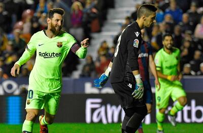 Lionel Messi, left, and Barcelona face Lyon in the Uefa Champions League last-16. AFP
