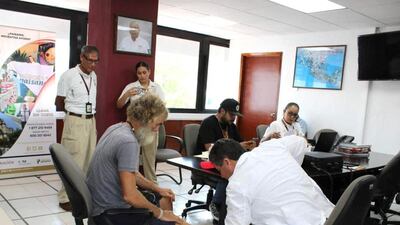 Mr Shaddock is checked by a doctor. Reuters