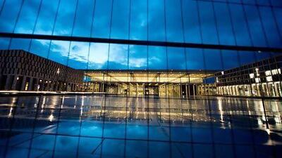 A fence protects the site of the terminal building under construction at the Berlin Brandenburg Airport Willy Brandt in March of 2012. Johannes Eisele / AFP
