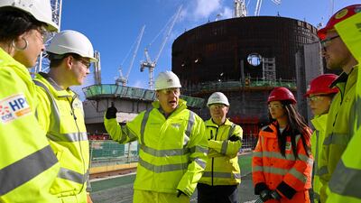 UK Prime Minister Boris Johnson meets apprentices during his visit to Hinkley Point C nuclear power plant in Bridgwater last week. AFP
