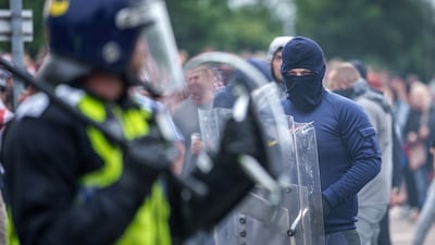 Anti-immigration protesters outside a hotel being used to house asylum seekers in Rotherham, England. Getty