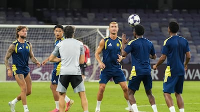 Cristiano Ronaldo trains with Al Nassr teammates ahead of their Asian Champions League clash with Al Ain at Hazza bin Zayed Stadium. Pawan Singh for The National