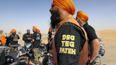 'Deg Teg Fateh' is a Sikh slogan in Punjabi that signifies the responsibility of providing food and protection for the needy and oppressed. Pawan Singh / The National