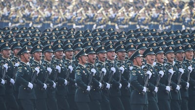 Chinese troops march. AFP