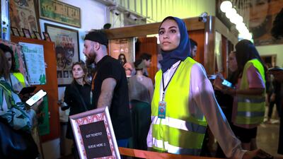 A volunteer at Cinema Akil before the film presentations and workshops