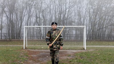 A cadet holds a model of a sword in front of a goalpost as he trains in Stavropol, Russia. Eduard Korniyenko / Reuters