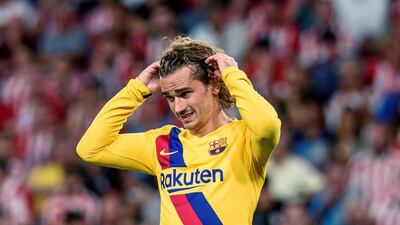 Antoine Griezmann reacts during the match. The Frenchman, who moved from Atletico Madrid to the league champions, endured a quiet debut. EPA