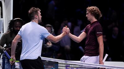 Jack Sock, left, greets Alexander Zverev at the net after his victory in the ATP Finals on Thursday. Toby Melville / Reuters