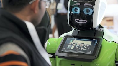 Companies need to leverage the benefits that AI offers, while safeguarding human connections. Chris Whiteoak / The National