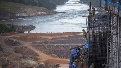 The Teles Pires dam is a gravity dam constructed of composite materials layered on a roller-compacted concrete core. Roosevelt Cassio / Reuters