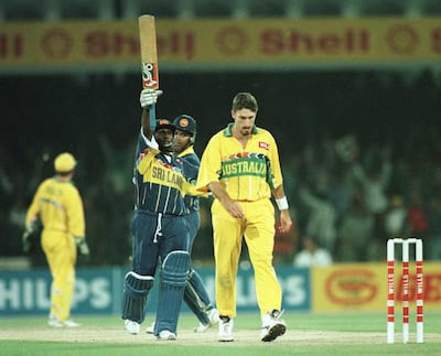Aravinda de Silva, bat raised, and Arjuna Ranatunga spearheaded Sri Lanka's successful World Cup campaign in 1996, beating Australia in the final. Getty Images