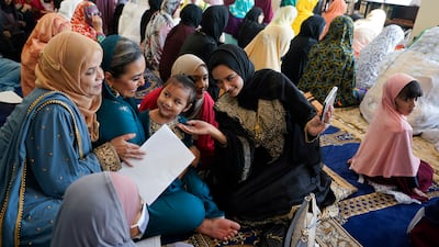 Muslims gather before Eid Al Fitr prayers at the Muslim Community Centre in Silver Spring, Maryland. There are signs that Muslim Americans are gaining more visibility. AP