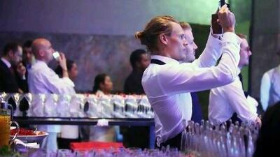 Server Thomas Anostam takes an opportunity to record the memorable events at the Gourmet Abu Dhabi Awards Gala dinner.