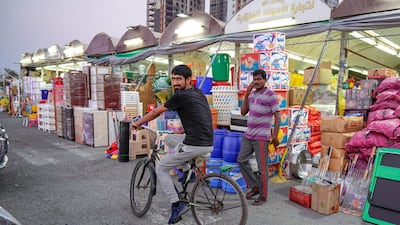 Dusk falls as vendors sell homeware and appliances at the souq