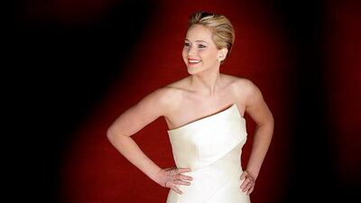 Cast member Jennifer Lawrence arrives for the screening of the movie "The Hunger Games: Catching Fire" at the Rome Film Festival November 14, 2013. REUTERS/Niccolo Brussa (ITALY - Tags: ENTERTAINMENT)