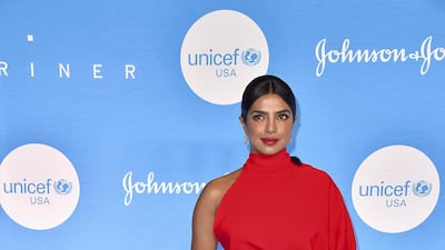 Priyanka Chopra looks good in red, and this Salvatore Ferragamo gown is modern and elegant. AFP