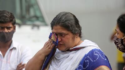 The fire in a 19-storey building killed at least six people and injured more than a dozen, city officials said. AP Photo