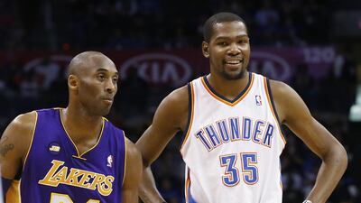 Oklahoma City Thunder forward Kevin Durant, right, says Los Angeles Lakers guard Kobe Bryant was one of the players he looked up to growing up. Sue Ogrocki / AP Photo
