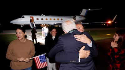 Family members embrace freed Americans Siamak Namazi, Morad Tahbaz and Emad Shargi — as well as two returnees whose names have not yet been released by the U. S. government — who were released in a prisoner swap deal between U. S and Iran, as they arrive at Davison Army Airfield at Fort Belvoir, Virginia, U. S. , September 19, 2023. REUTERS / Jonathan Ernst / Pool