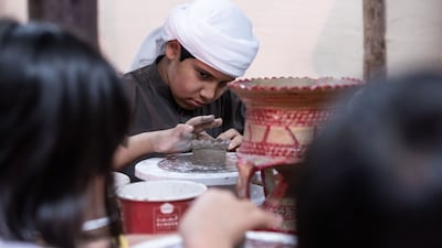 Children busy with activities at Qasr Al Hosn
