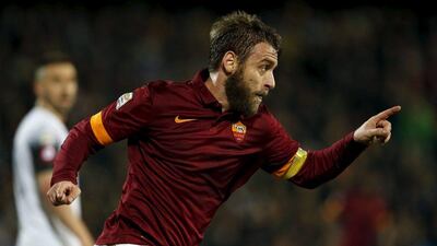 AS Roma's Daniele De Rossi celebrates after scoring against Cesena during their Serie A victory on Sunday. Alessandro Garofalo / Reuters / March 22, 2015