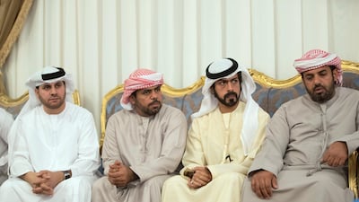 Sheikh Khalifa bin Tahnoon , Director of the Martyrs' Families' Affairs Office of the Abu Dhabi Crown Prince Court, second right, offers condolences. Mohamed Al Baloushi for the Crown Prince Court - Abu Dhabi