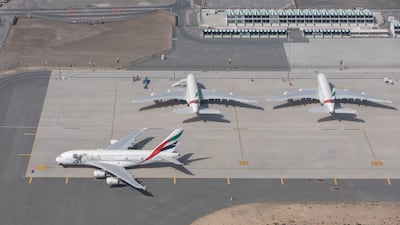 Passenger aircraft at Al Maktoum International Airport in Dubai in June last year. Bloomberg