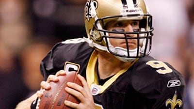 New Orleans Saints quarterback Drew Brees (19) drops back to pass.