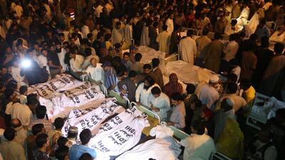The bodies of victims of a suicide bomb attack at a hospital in Lahore on November 2. EPA