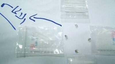 Diamonds found by Customs officers on a passenger who arrived at Abu Dhabi airport worth about Dh240,000. The Arab passenger had the precious stones hidden in his socks. Photo courtesy Abu Dhabi Department of Finance