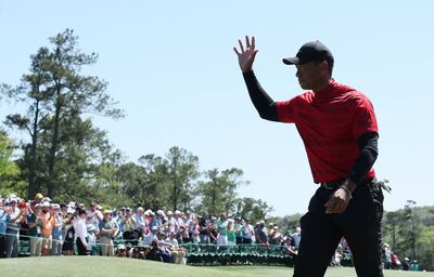 Tiger Woods salutes the crowd after completing his final round at the Masters. Reuters