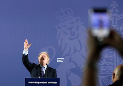 Britain's Prime Minister Boris Johnson reacts as he delivers a speech at the Old Royal Naval College in London. AFP