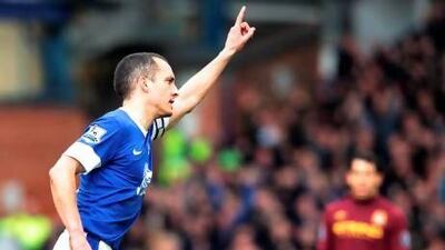 Leon Osman, left, capped a memorable week personally by scoring a stunning goal against Manchester City at Goodison Park. Lindsey Parnaby / AFP