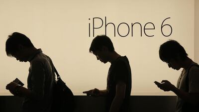 Readers say the iPhone is meant for everybody and not just for the simple-minded. Vincent Yu / AP Photo