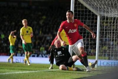 Ryan Giggs was often at the centre of a tug-of-war between Manchester United and Wales. PA