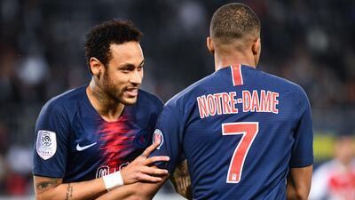 Paris Saint-Germain's Brazilian forward Neymar, left,) and teammate Kylian Mbappe. AFP