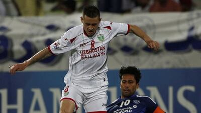 Midfielder Server Djeparov is Lokomotiv's star player and has twice been named Asian Player of the Year. Karim Sahib / AFP