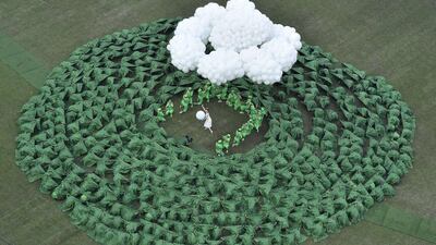 Performers take part in the opening ceremonies of the 2015 Athletics World Championships in Beijing on Saturday. Antonin Thuillier / AFP