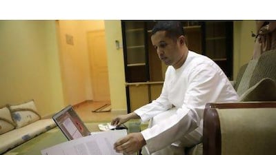 Government worker Ahmed A Hashemi is studying for a Bachelor's degree in HR online. Sammy Dallal / The National