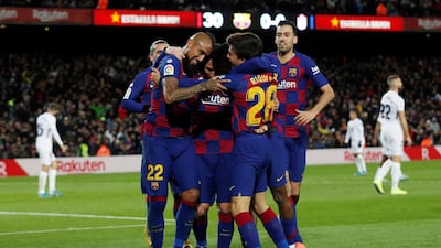 Barcelona's Lionel Messi celebrates scoring. Reuters