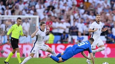 Andraz Sporar of Slovenia is fouled by Conor Gallagher of England. Getty Images