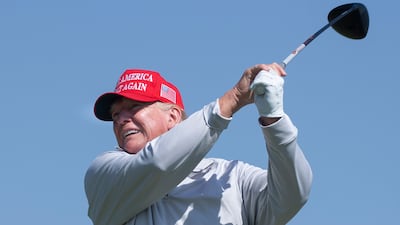 Former US president Donald Trump tees off during the pro-am tournament of the 2023 LIV Golf DC at Trump National Golf Club in Sterling, Virginia. EPA